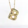 Wholesale Simple Style Classic Style Letter Copper 18k Gold Plated Pendant Necklace In Bulk