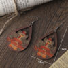 oly-6758b92a18ffca8e6fb086b70bd41037 Wholesale New cross-border Thanksgiving leopard print polka dot turkey teardrop-shaped hollowed-out pendant earrings, distressed wooden double-sided earrings