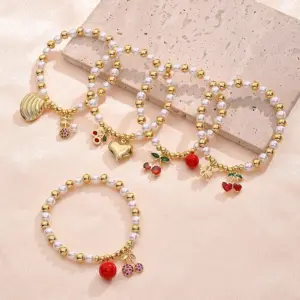 Wholesale IG Style Pentagram Cherry Heart Shape 18K Gold Plated Zircon Imitation Pearl Copper Beaded Chain Beaded Bracelets Wholesale