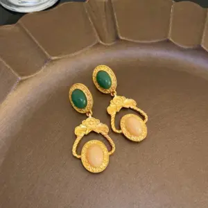 51# Silver Needle Mid-Ancient Oval Earrings