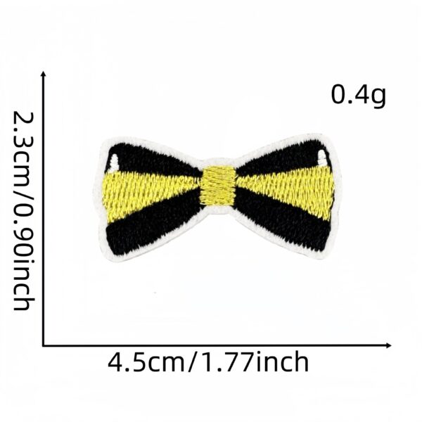 oly-68eff9cdab8a0aa9cc0a6e08576c4f0e Wholesale Current Cartoon Black and Gold Graduation Season Embroidered Fabric Patches, Decorative Badges, Labels, Clothing Accessories, Ironing Hot Melt Adhesive