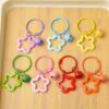 Wholesale Colorful five-pointed star acrylic keychain pendant dopamine earphone case ornaments small fresh couple bag decoration