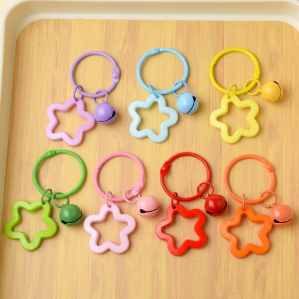 Wholesale Colorful five-pointed star acrylic keychain pendant dopamine earphone case ornaments small fresh couple bag decoration