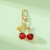 oly-6912dda51b27dea93c81d06b232c200c Wholesale Couple Keychain Resin Red Cherry Key Chain Alloy Accessories Cherry Pendant Student School Bag Pendant Accessories
