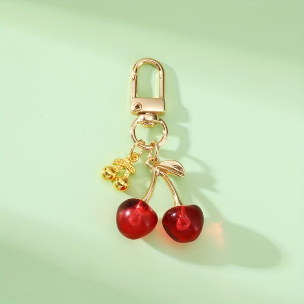 oly-6912dda51b27dea93c81d06b232c200c Wholesale Couple Keychain Resin Red Cherry Key Chain Alloy Accessories Cherry Pendant Student School Bag Pendant Accessories