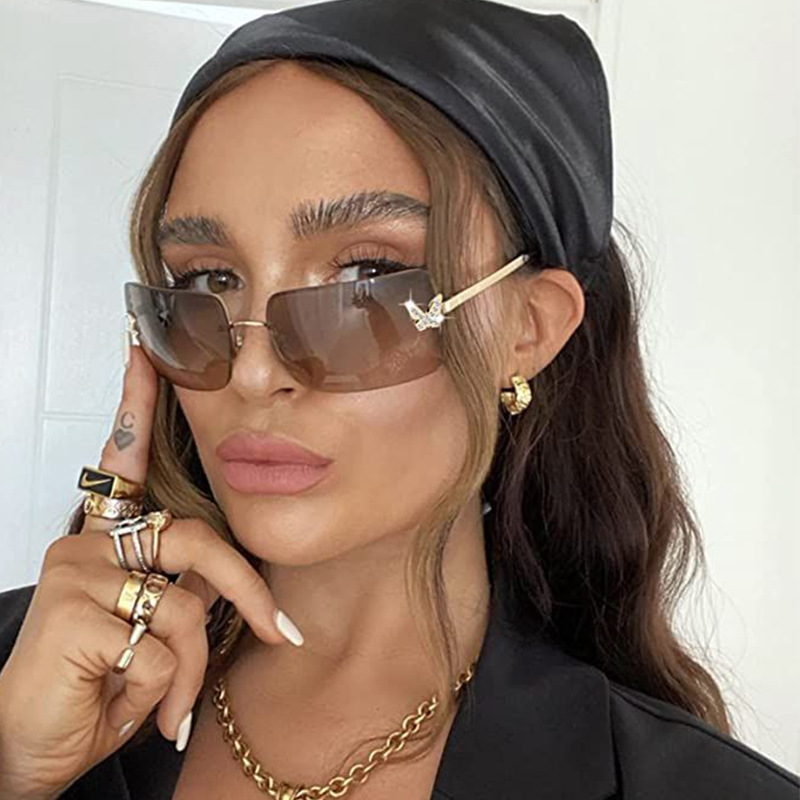 Wholesale 2024 new frameless sunglasses European and American sunscreen glasses fashion high sense butterfly aessories diamond sunglasses ladies