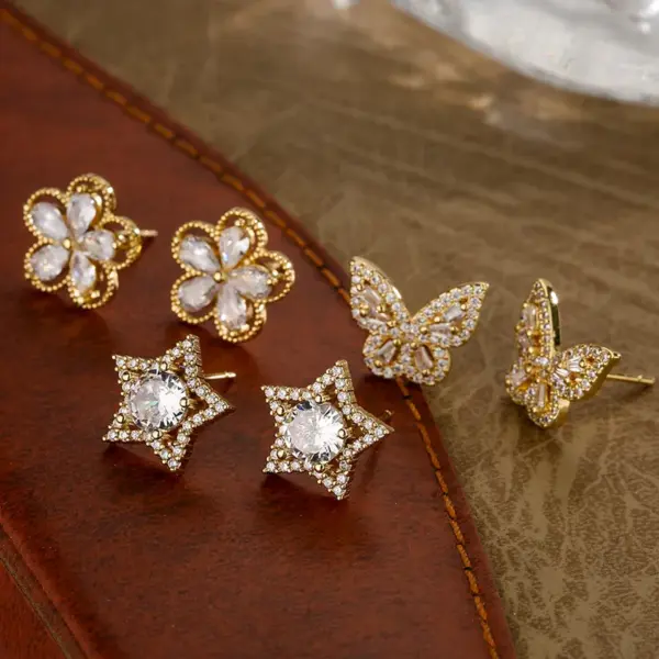 Wholesale 1 Pair Fashion Star Flower Butterfly Inlay Copper Zircon 18k Gold Plated Ear Studs