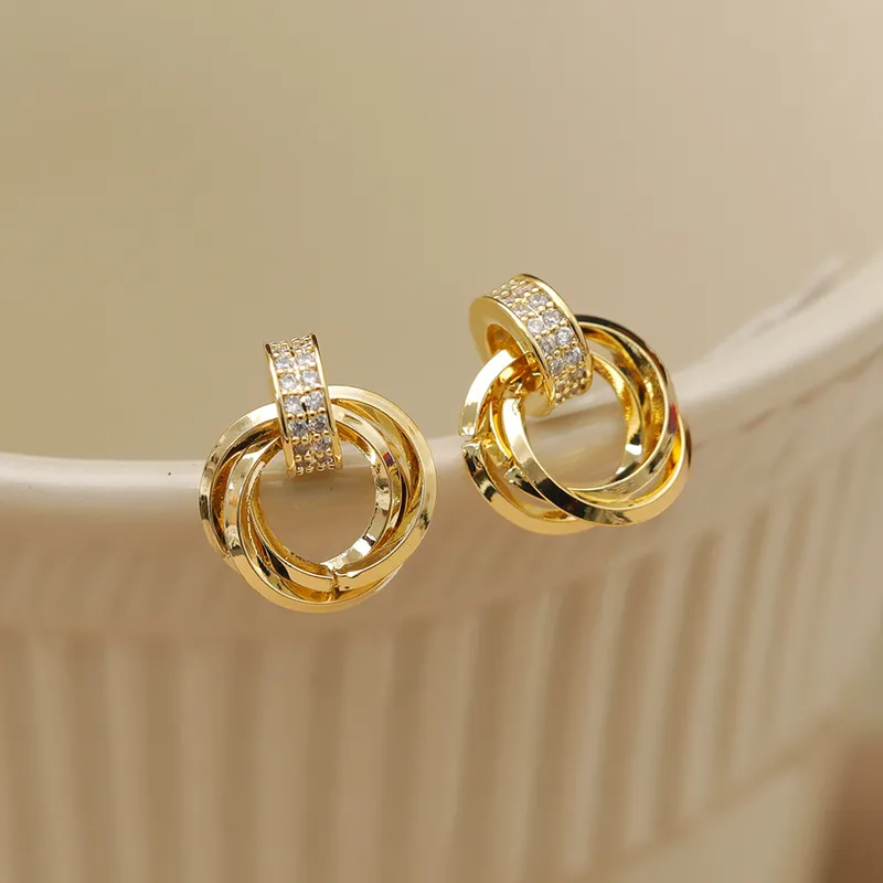 Wholesale Copper Geometric Round Zircon 14K Gold Plated Vintage Style Simple Style Gold Ear Studs