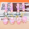 Wholesale Shake the sound explosion acrylic oil snowflake pink key chain car pendant exquisite schoolbag key ring pendant