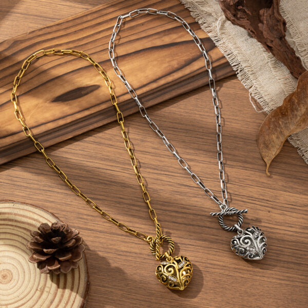 Wholesale Cross-Border Retro Gold Tang Grass Pattern Love Hollow Pendant Necklace Women's Light Luxury Fashion Temperament Niche Design