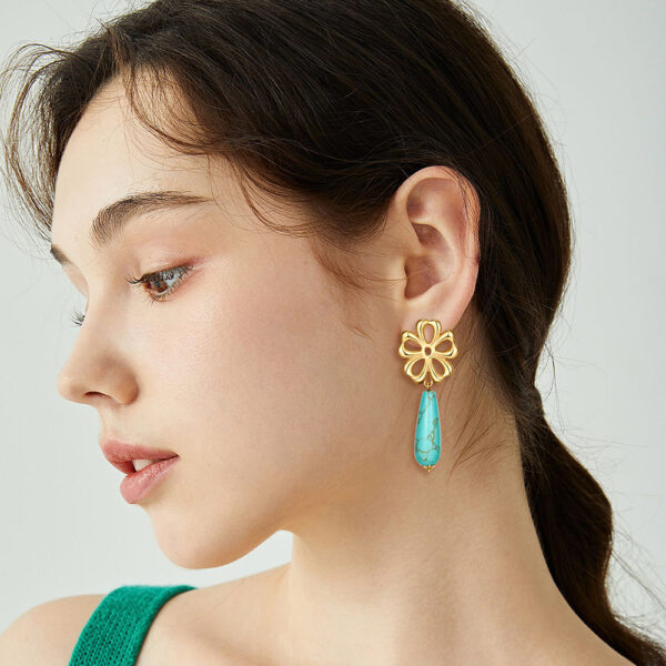 Wholesale Hollow out sunflower earrings