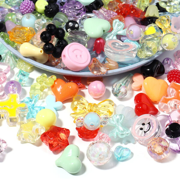 oly-6a95f0fa5b304b0e2bb64a1d20e8ce20 Wholesale Acrylic phone charm with random mixed cartoon beads