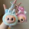 Wholesale Plush Big Head High-End Labubu School Bag Pendant Vinyl Doll Doll Pendant Car Keychain Wholesale Small Gifts