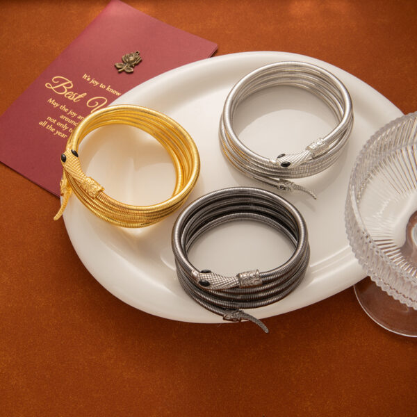 oly-6ab9241e0014ca7abe3bae9b4f321450 Wholesale Cross-border Europe and the United States Exaggerated Metal Bracelet Golden Winding Year Snake Bracelet Retro High-grade Light Luxury Jewelry