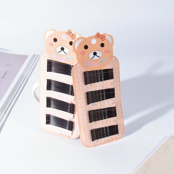 Wholesale Korean version of jewelry classic black fine hairpin edge clip stall supply a small commodity