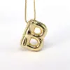 Wholesale Simple Style Classic Style Letter Copper 18k Gold Plated Pendant Necklace In Bulk