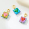 Wholesale Dopamine-enhanced colored polka dot heart-shaped glass pendant, DIY bracelet, necklace, universal buckle jewelry accessory