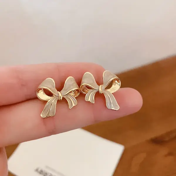 Wholesale Fashion Butterfly Bow Knot Copper Inlaid Zircon Artificial Pearls Earrings 1 Pair