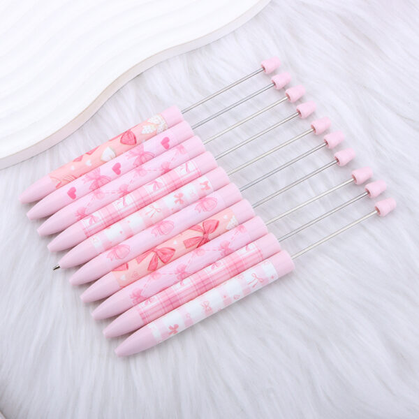 oly-6c191582e53073f14f351e31407ced6e Wholesale DIY long printed beaded pen with pink bow pattern