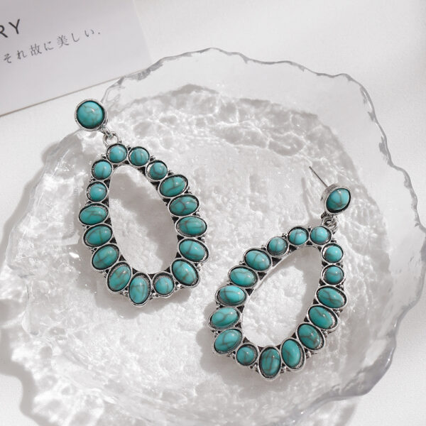 oly-6cd74731c4a8f74932ab78bef9b3ba7f Wholesale Europe and the United States exaggerated earrings retro oval turquoise drop hollow earrings earrings foreign trade jewelry