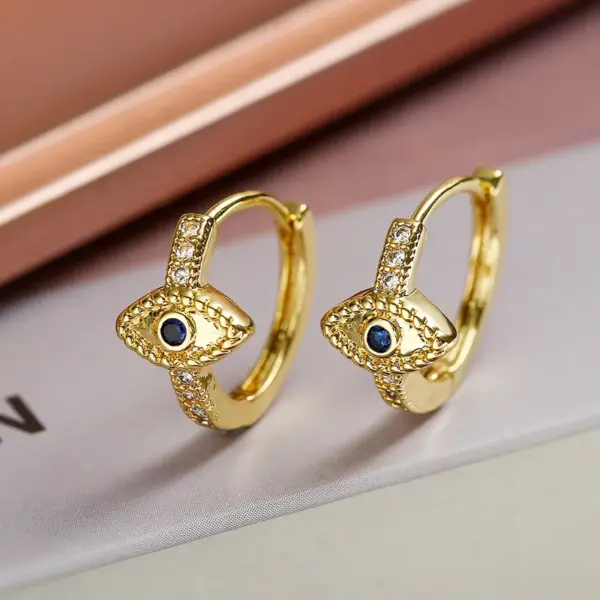 Wholesale 1 Pair Simple Style Streetwear Commute Devil's Eye Plating Inlay Copper Zircon 18k Gold Plated Earrings