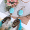 Wholesale Turquoise long feather earrings
