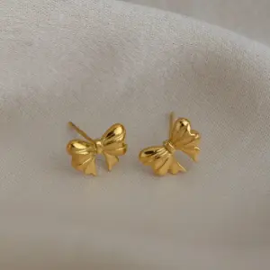 Wholesale PVD Coated Real Gold Plated 18K Gold Bow Knot 304 Stainless Steel Vacation Simple Style Waterproof Non Tarnish Ear Studs