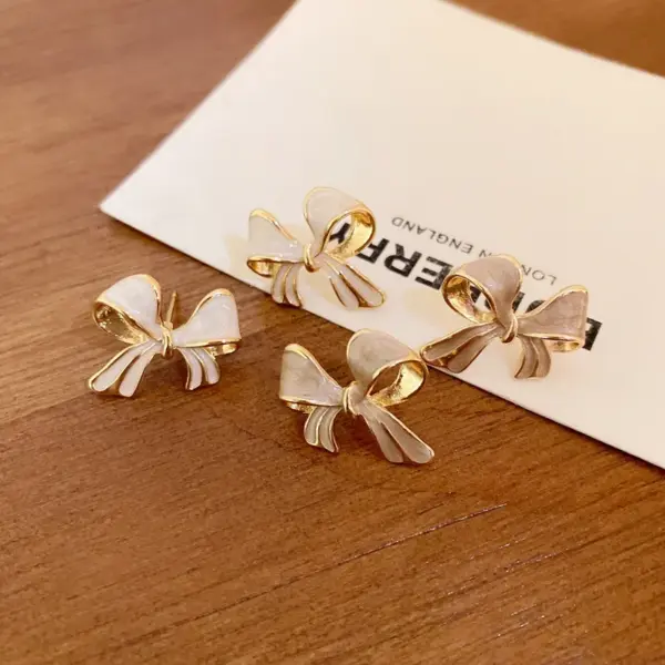 Wholesale Fashion Butterfly Bow Knot Copper Inlaid Zircon Artificial Pearls Earrings 1 Pair