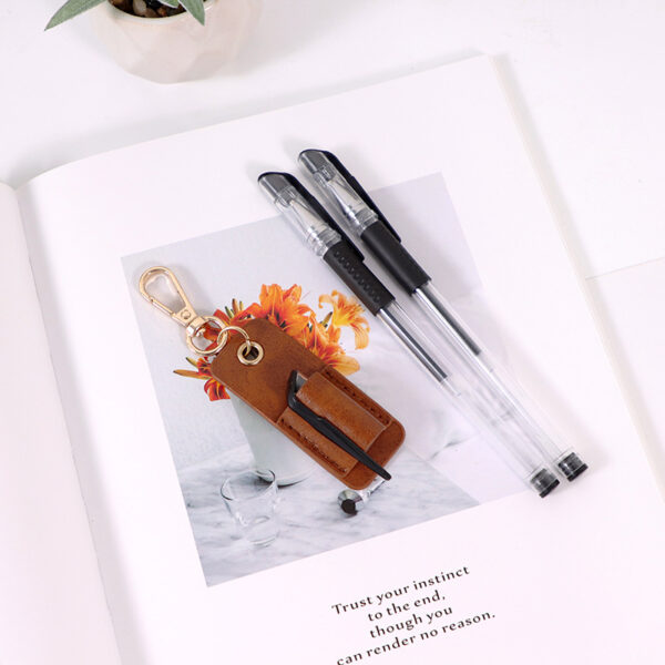 oly-6d4e260cf558dfad20e90e432d1d692f Wholesale Neck Pencil Bag Portable Small Leather Pen Clip Key Pendant