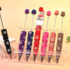 Wholesale Daisy-themed rhinestone ballpoint pen
