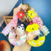 Wholesale Creative new oil Sanrio donut quicksand key chain car key chain package pendant small gift