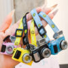 Wholesale 1688 Cotton Doll Smiley Face Strap Webbing Luminous Sound Camera Pendant Ppy Mini Camera Backpack Bag