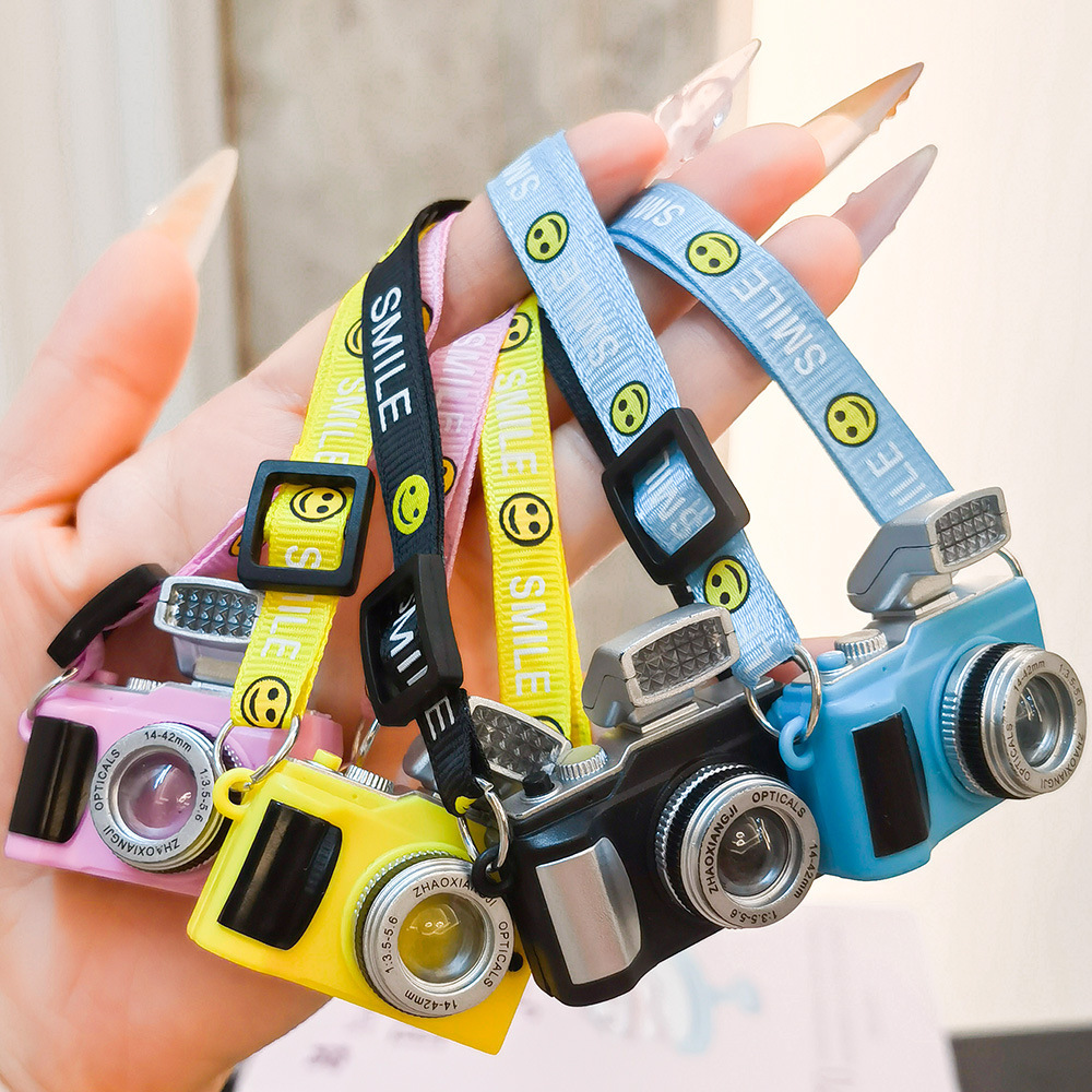 Wholesale 1688 Cotton Doll Smiley Face Strap Webbing Luminous Sound Camera Pendant Ppy Mini Camera Backpack Bag