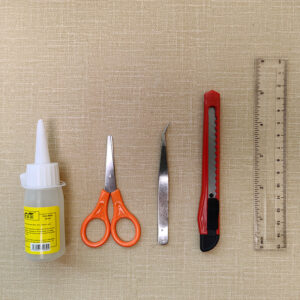 scissors tweezers ruler glue art knife