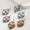 Wholesale Retro-style turquoise inlaid geometric cross earrings for women