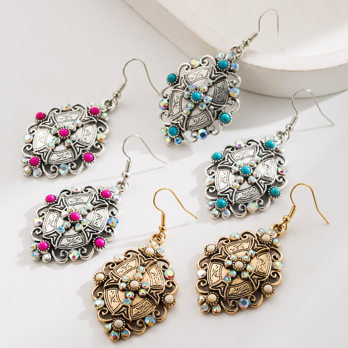 Wholesale Retro-style turquoise inlaid geometric cross earrings for women