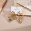 Wholesale PVD Coated Real Gold Plated 18K Gold Round Leaves Eye 304 Stainless Steel Casual Elegant Waterproof Non Tarnish Earrings