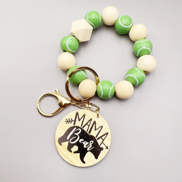 oly-70835eb0ed1425a112135a62b602a781 Wholesale sports style football basketball baseball and other wooden beads beaded polar bear