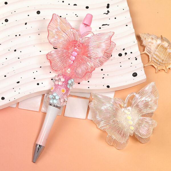 oly-71d4dd12329a70e46c8415446672dbce Wholesale 3D iridescent gradient butterfly through-hole beaded resin butterfly hollow DIY jewelry wing accessories