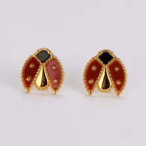 Gold stud earrings