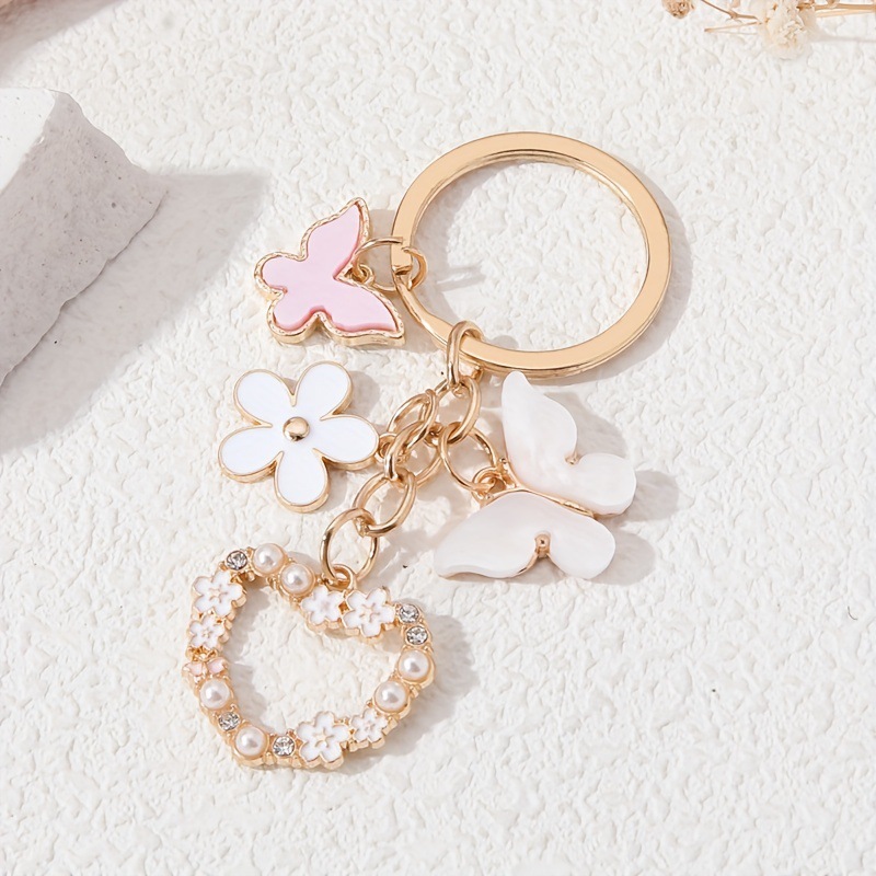 Wholesale New butterfly flower alloy key chain pendant love diamond cute small white flower pendant key chain aessories