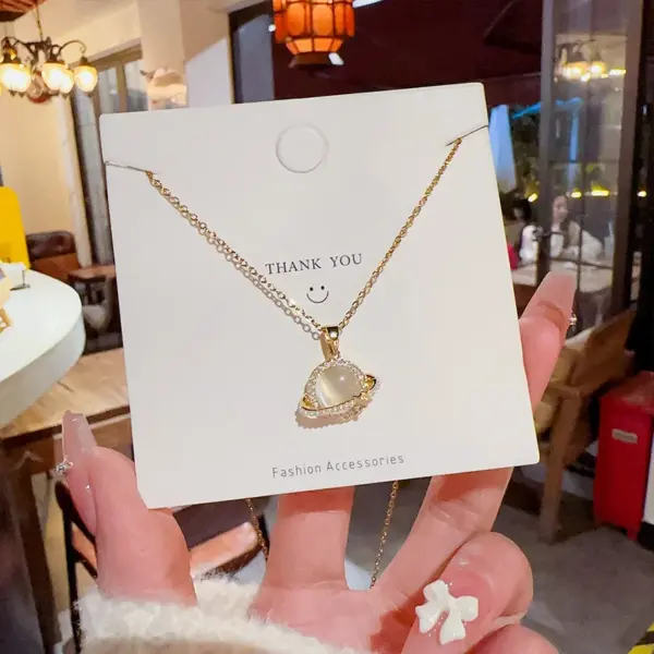 Wholesale Jewelry IG Style Novelty Planet Titanium Steel Cat's Eye Stone Zircon Plating Inlay Pendant Necklace