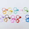 Wholesale Acrylic colorful five-pointed star key ring earphone case bag pendant paint card ring bell decorative key chain