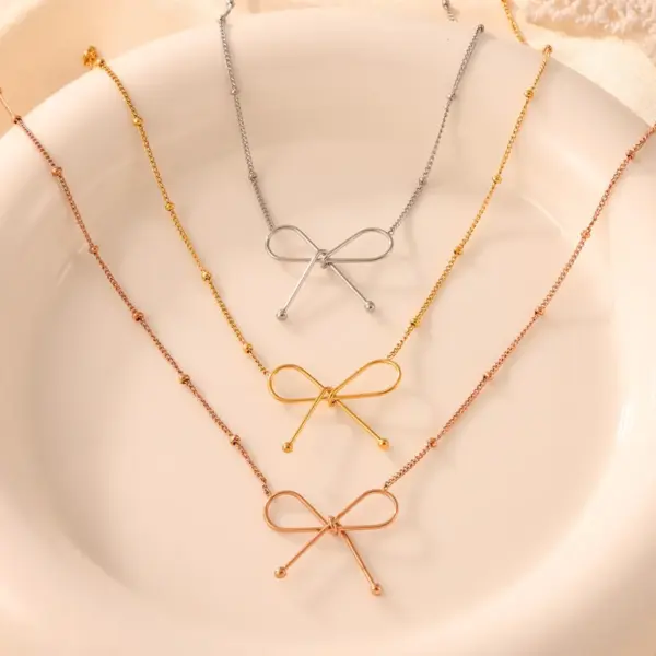Wholesale PVD Coated Real Gold Plated 18K Gold Bow Knot 304 Stainless Steel Casual Simple Style Commute Waterproof Non Tarnish Bracelets Necklace