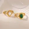 Wholesale Luxurious Vintage Large Imitation Pearl Women's Ring 18K Gold Plated Four-Leaf Clover Rotating Heart Blue Zircon Jewelry Ring