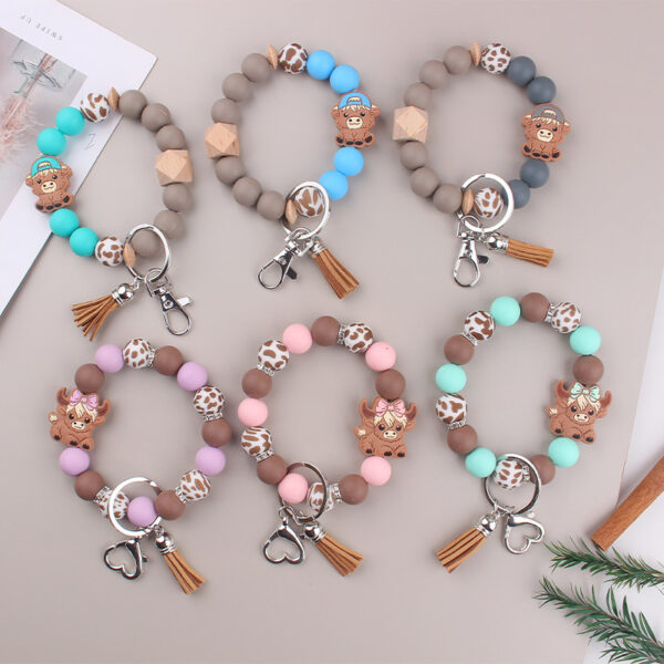 Wholesale New Cartoon Cow Consumption Silicone Bracelet Keychain Creative DIY Silicone Handmade Beaded Bracelet Women's Jewelry