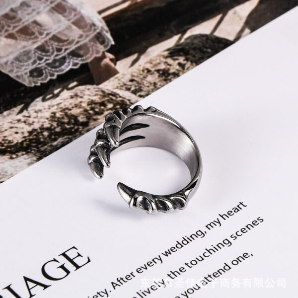 oly-7639dd567f5093828ff05b56b3c633e3 Wholesale retro agon claw titanium steel ring personality men's sharp open ring casting jewelry SA804