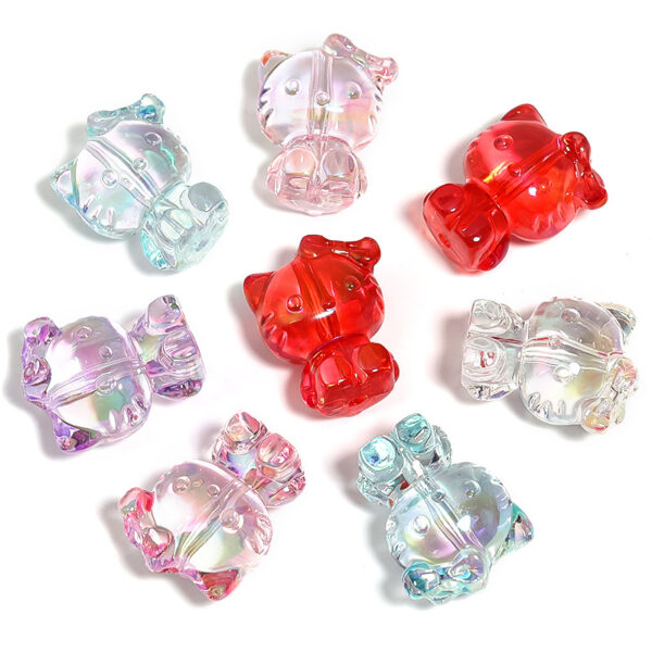 oly-765b83816a9b01e9b5e71a0ff44a472c Wholesale High-transparent magic beaded stereo bow kitten vertical hole beads diy mobile phone chain keychain aessories