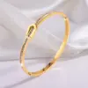 Wholesale 304 Stainless Steel Geometric Solid Color PVD Coated Rhinestones Real Gold Plated 18K Gold Hip-Hop Waterproof Non Tarnish Bangle