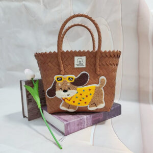 Brown portable basket with brown glasses dog